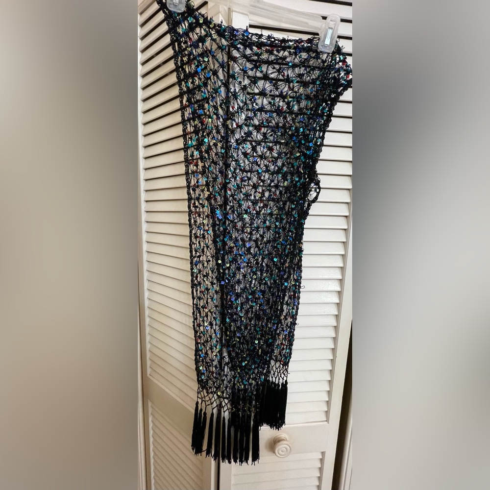 Women’s black crocheted shawl with sequins. 64” X 12”.
